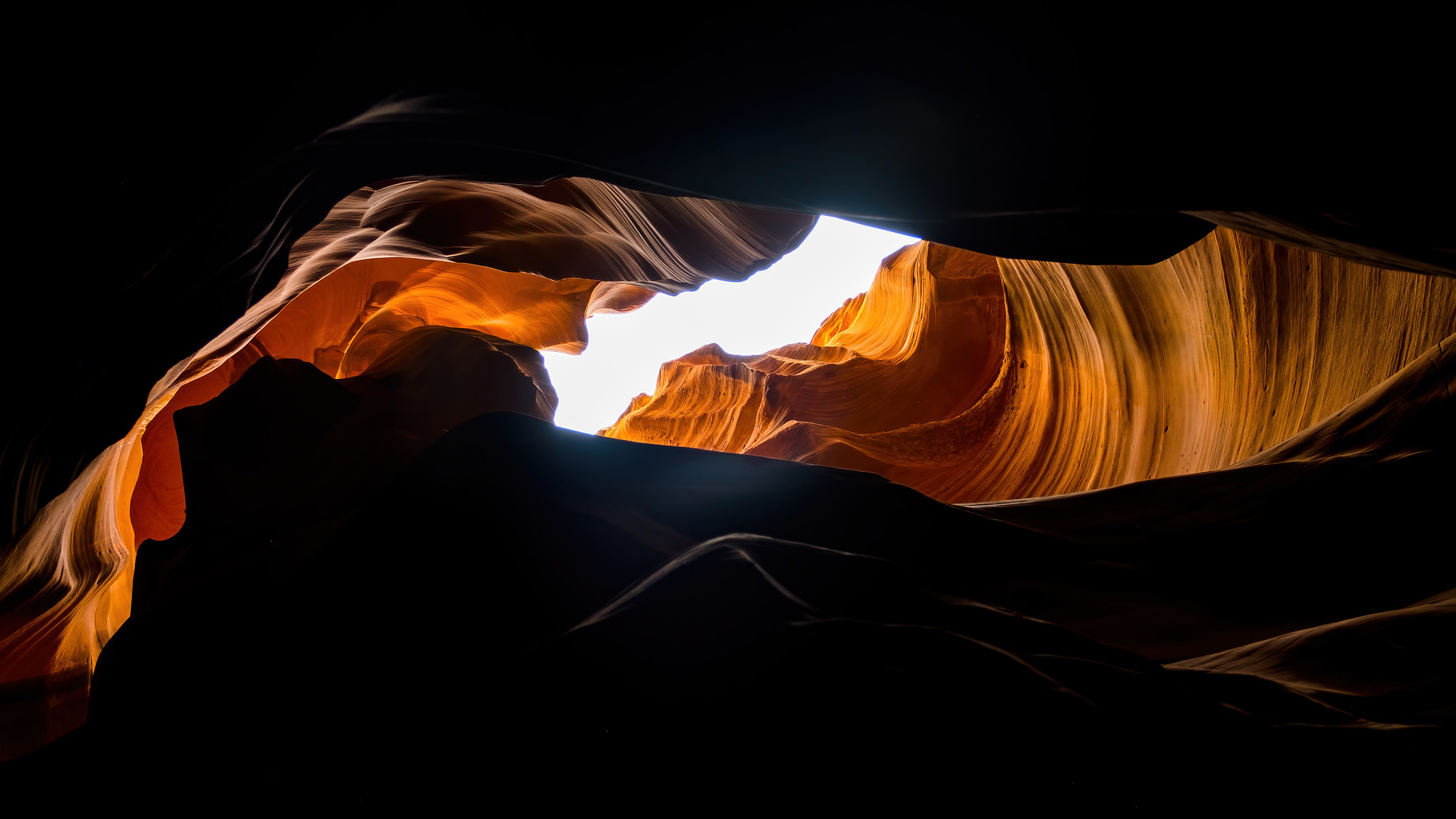 Light beaming through an opening in Antelope Canyon