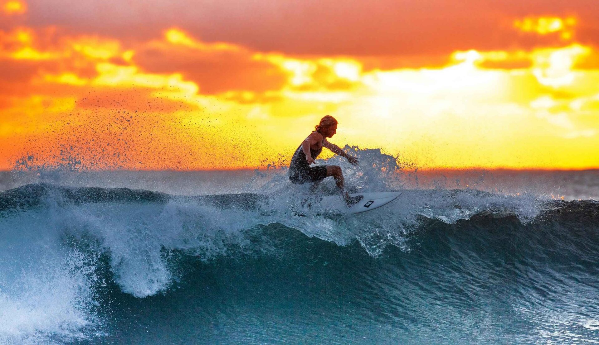 Man Surfing on Waves